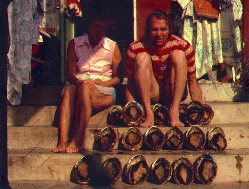  Dennis Downie and his mother, Tony Downie, on her back porch in Bird Rock with 18 green abs. That was a good day.  Approx 1969 - photo provided by Dennis Downie