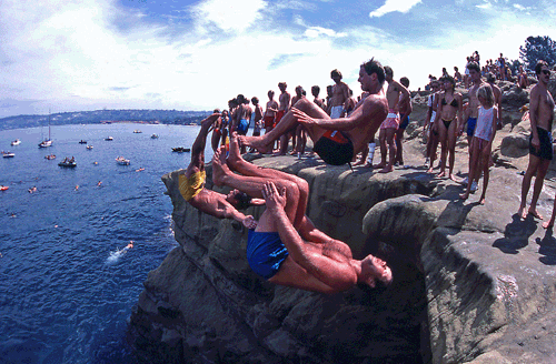 Kurt "Dirty Kurty" Sladler (closest) Eric Powers (middle) and Fost Thompon show how to do a triple sumersault off the clam - Photo by Brian Munoz and used in La Jolla Manazine